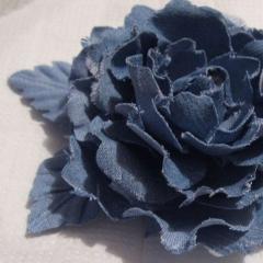 Sewn fabric flowers.  We make flowers from fabric.  Fabric flower leaves